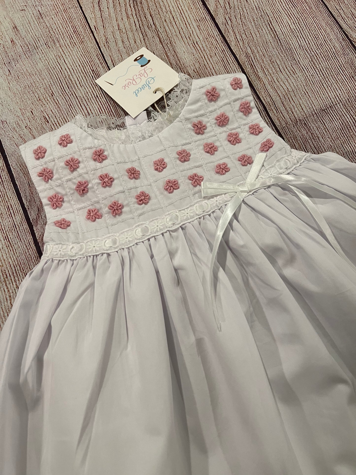WHITE DRESS w/ PINK EMBROIDERED FLOWERS WITH WHITE RIBIBON ( fully lined )